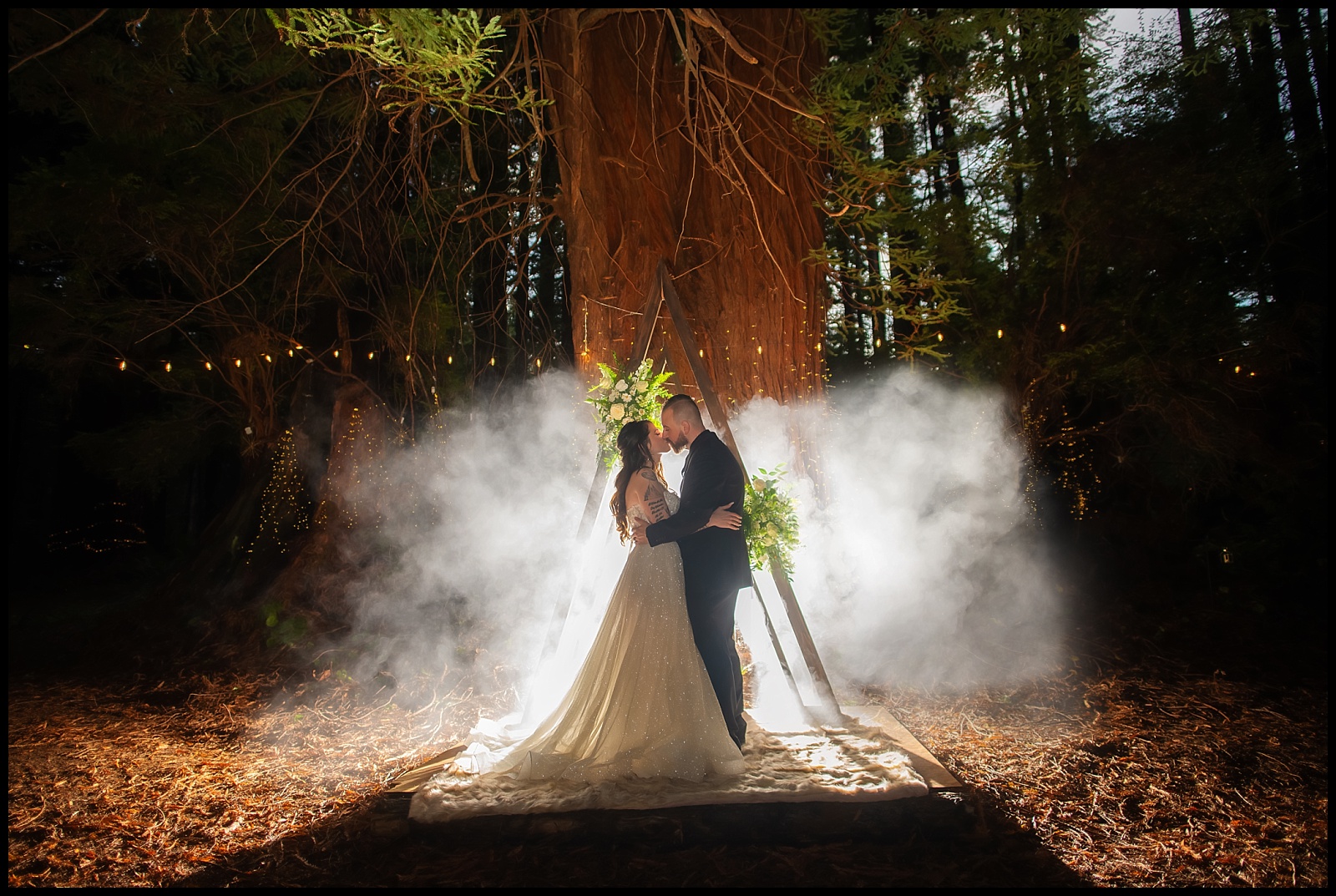 A breathtaking, enchanted wedding nestled among the towering redwoods, where twinkling, sparkly lights danced through the trees, creating a magical atmosphere filled with wonder and romance. 